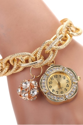 Gold watch with gold bracelet