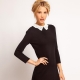 A black dress with a white collar is the epitome of modesty and style.