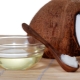 Applying coconut oil to the face